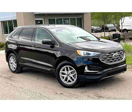 2022 Ford Edge SEL is a Black 2022 Ford Edge SEL SUV in Ortonville MI