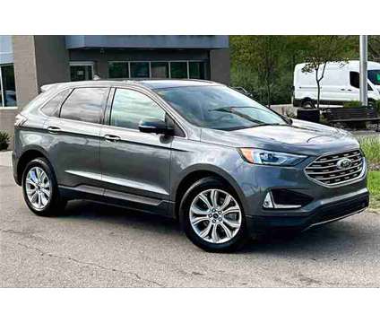 2022 Ford Edge Titanium is a Grey 2022 Ford Edge Titanium SUV in Ortonville MI