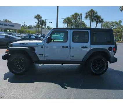 2021 Jeep Wrangler Unlimited Willys 4x4 is a Silver 2021 Jeep Wrangler Unlimited SUV in Daytona Beach FL