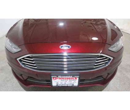 2018UsedFordUsedFusionUsedFWD is a Red 2018 Ford Fusion Car for Sale in Brunswick OH