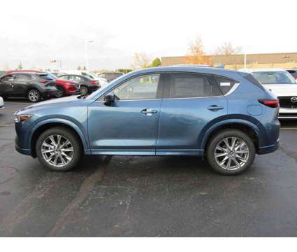 2024NewMazdaNewCX-5NewAWD is a Blue 2024 Mazda CX-5 Car for Sale in Brunswick OH