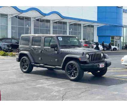 2017 Jeep Wrangler Unlimited Sahara is a Grey 2017 Jeep Wrangler Unlimited Car for Sale in Elgin IL