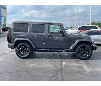 2017 Jeep Wrangler Unlimited Sahara is a Grey 2017 Jeep Wrangler Unlimited Car for Sale in Elgin IL