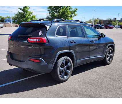 2015 Jeep Cherokee Latitude Altitude is a Black 2015 Jeep Cherokee Latitude Car for Sale in Denver CO