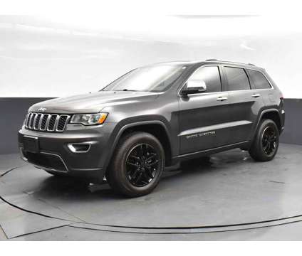 2021 Jeep Grand Cherokee Limited is a Grey 2021 Jeep grand cherokee Limited SUV in Jackson MS