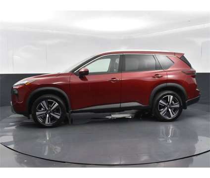 2024 Nissan Rogue SL is a Red 2024 Nissan Rogue SL SUV in Columbus GA