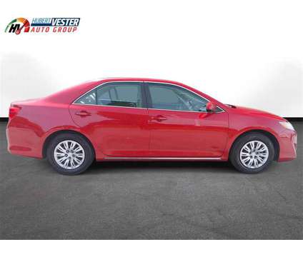 2013 Toyota Camry LE is a Red 2013 Toyota Camry LE Sedan in Wilson NC