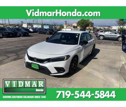 2024 Honda Civic Sport is a Silver, White 2024 Honda Civic Sport Car for Sale in Pueblo CO