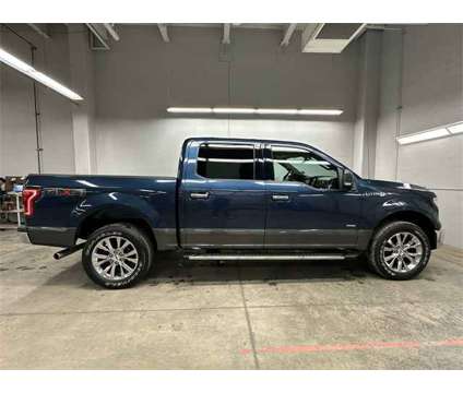 2017 Ford F-150 XLT is a Blue 2017 Ford F-150 XLT Truck in Zelienople PA