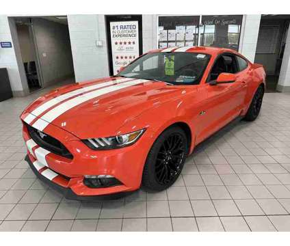 2015 Ford Mustang GT is a Orange 2015 Ford Mustang GT Coupe in Milwaukee WI