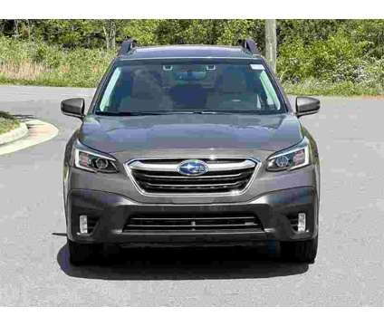 2021 Subaru Outback Premium is a Tan 2021 Subaru Outback 2.5i SUV in Sterling VA