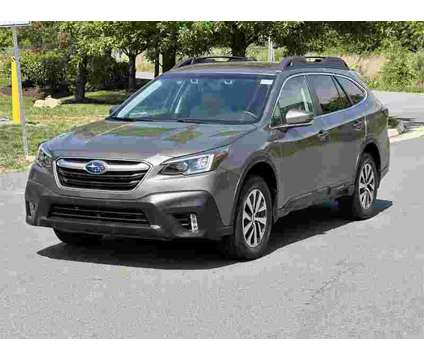 2021 Subaru Outback Premium is a Tan 2021 Subaru Outback 2.5i SUV in Sterling VA