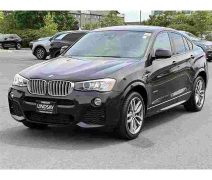 2018 BMW X4 xDrive28i is a Black 2018 BMW X4 xDrive28i SUV in Sterling VA