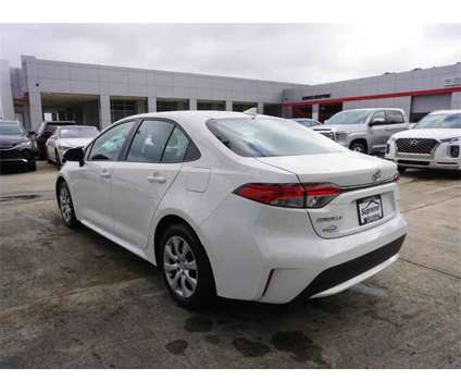 2021 Toyota Corolla LE is a White 2021 Toyota Corolla LE Sedan in Hammond LA