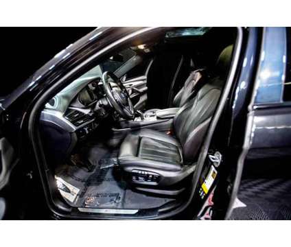 2018 BMW X6 xDrive50i is a Black 2018 BMW X6 xDrive50i SUV in Peoria AZ