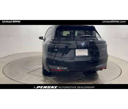 2024 BMW iX xDrive50 is a Black 2024 BMW 325 Model iX SUV in Alpharetta GA