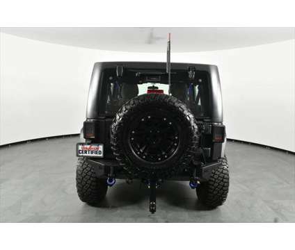 2017 Jeep Wrangler Unlimited Sport 4x4 is a Black 2017 Jeep Wrangler Unlimited Sport SUV in Orlando FL