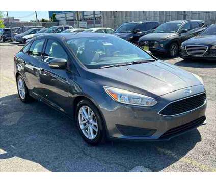 2015 Ford Focus SE is a 2015 Ford Focus SE Sedan in Stamford CT