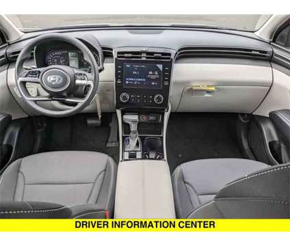 2024 Hyundai Tucson SE is a Grey 2024 Hyundai Tucson SE SUV in North Aurora IL