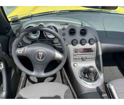 2007 Pontiac Solstice Base is a Yellow 2007 Pontiac Solstice Base Convertible in Utica NY