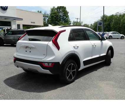 2024 Kia Niro EX is a White 2024 Kia Niro EX Station Wagon in Queensbury NY