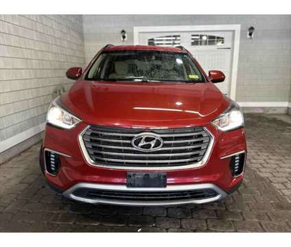 2017 Hyundai Santa Fe SE is a Red 2017 Hyundai Santa Fe SE SUV in Barre VT