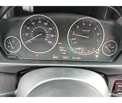 2013 BMW 3 Series xDrive is a Silver 2013 BMW 3-Series Sedan in Elmhurst IL