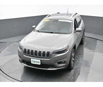 2021 Jeep Cherokee Limited 4X4 is a Grey 2021 Jeep Cherokee Limited SUV in Dubuque IA