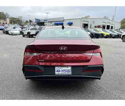 2024 Hyundai Elantra SEL is a Red 2024 Hyundai Elantra Sedan in Mobile AL