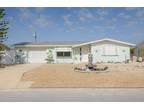 1127 Powersong St, Holiday, FL 34690