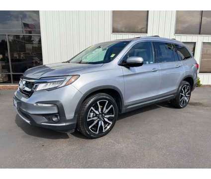 2020 Honda Pilot Touring is a Silver 2020 Honda Pilot Touring Car for Sale in Mcminnville OR
