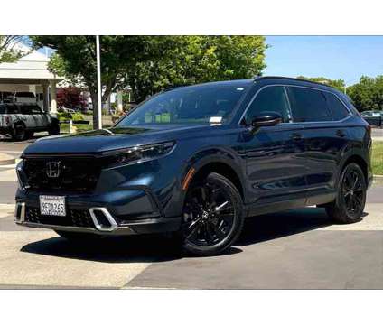 2023 Honda CR-V Hybrid Sport Touring is a Blue 2023 Honda CR-V Hybrid in Chico CA