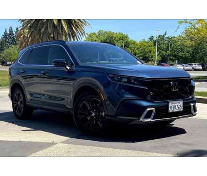 2023 Honda CR-V Hybrid Sport Touring is a Blue 2023 Honda CR-V Hybrid in Chico CA