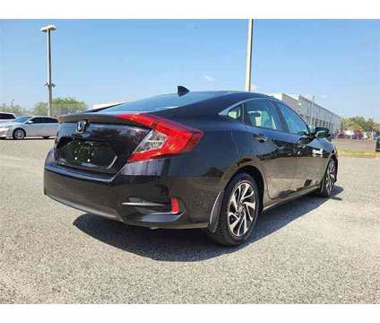 2017 Honda Civic EX is a Black 2017 Honda Civic EX Sedan in Orlando FL