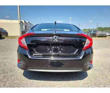 2017 Honda Civic EX is a Black 2017 Honda Civic EX Car for Sale in Orlando FL