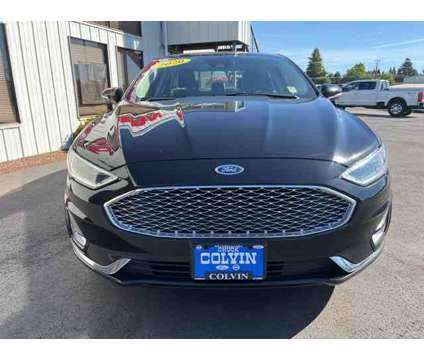2020 Ford Fusion Titanium is a Black 2020 Ford Fusion Titanium Car for Sale in Mcminnville OR