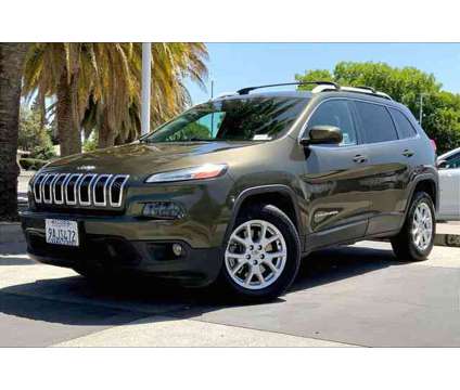 2015 Jeep Cherokee Latitude is a Green 2015 Jeep Cherokee Latitude Car for Sale in Chico CA