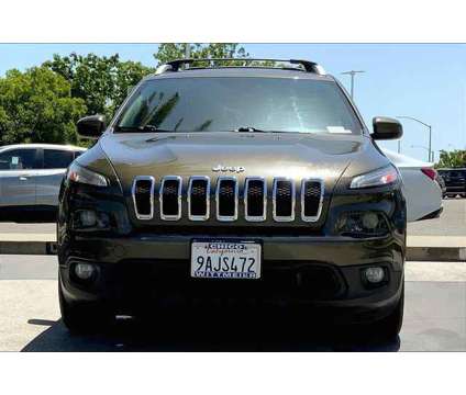 2015 Jeep Cherokee Latitude is a Green 2015 Jeep Cherokee Latitude Car for Sale in Chico CA