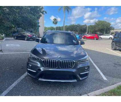 2017 BMW X1 xDrive28i is a Grey 2017 BMW X1 xDrive 28i Car for Sale in Orlando FL