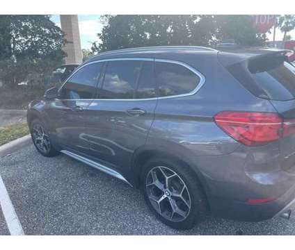 2017 BMW X1 xDrive28i is a Grey 2017 BMW X1 xDrive 28i Car for Sale in Orlando FL