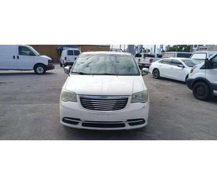 2014 Chrysler Town &amp; Country for sale is a White 2014 Chrysler town &amp; country Car for Sale in Miami FL