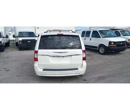 2014 Chrysler Town &amp; Country for sale is a White 2014 Chrysler town &amp; country Car for Sale in Miami FL