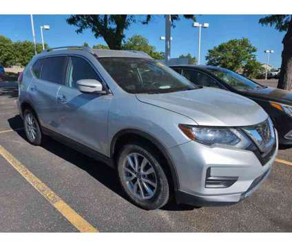 2018 Nissan Rogue SV is a Silver 2018 Nissan Rogue SV Car for Sale in Greeley CO