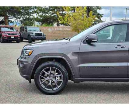 2021 Jeep Grand Cherokee 80th Anniversary is a Grey 2021 Jeep grand cherokee Car for Sale in Denver CO
