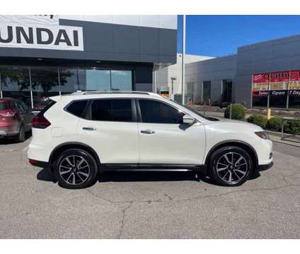 2018 Nissan Rogue SL is a White 2018 Nissan Rogue SL Car for Sale in Olathe KS