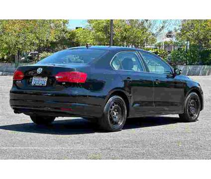 2014 Volkswagen Jetta 1.8T SE is a Black 2014 Volkswagen Jetta 1.8T SE Sedan in Newark CA