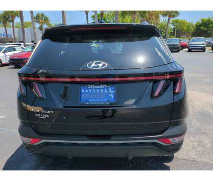 2022 Hyundai Tucson SEL is a Black 2022 Hyundai Tucson SE SUV in Daytona Beach FL