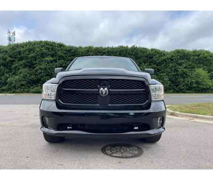 2014 Ram 1500 Quad Cab for sale is a Black 2014 RAM 1500 Model Car for Sale in Raleigh NC