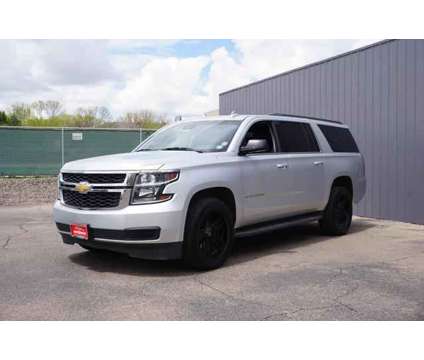 2020 Chevrolet Suburban for sale is a Silver 2020 Chevrolet Suburban 1500 Trim Car for Sale in Greeley CO