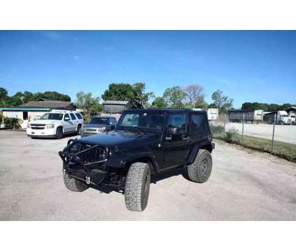 2011 Jeep Wrangler for sale is a Black 2011 Jeep Wrangler Car for Sale in Okeechobee FL